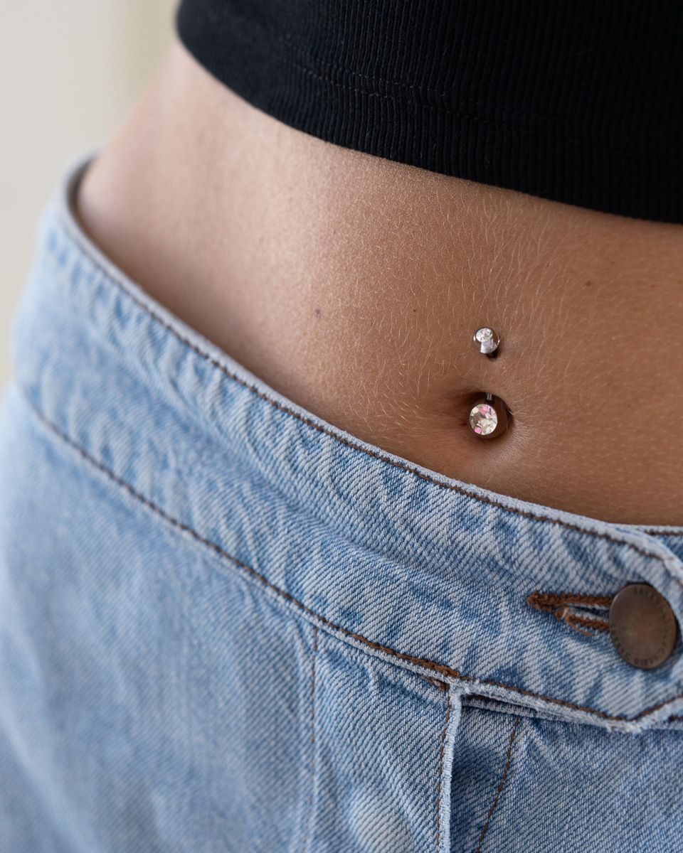 Piercing para el ombligo con bolas de acrílico y brillante