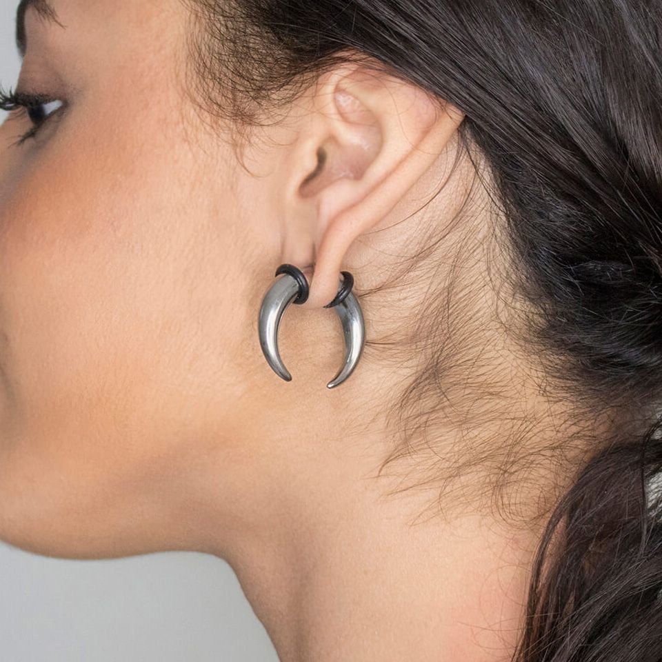 Taper en forma de c con aretes de caucho