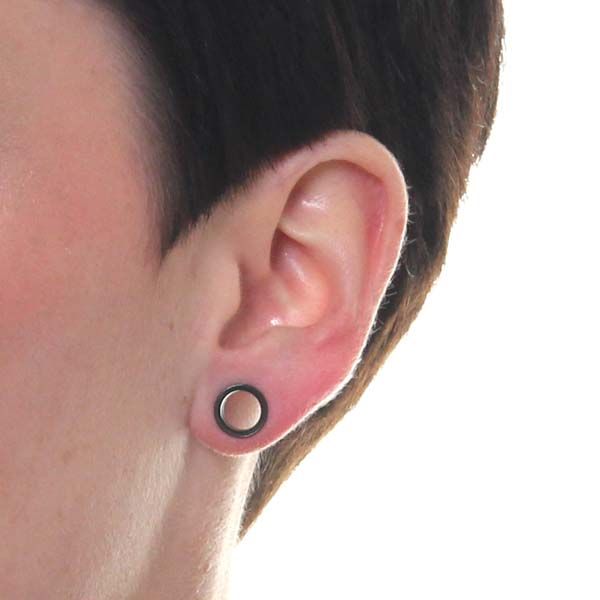 Túnel en acero quirúrgico con aretes
