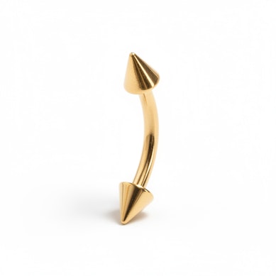 Barra curvada chapada en oro con pinchos