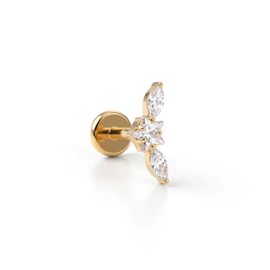 Labret de titanio con estrella central flanqueada por dos piedras corte marquesa