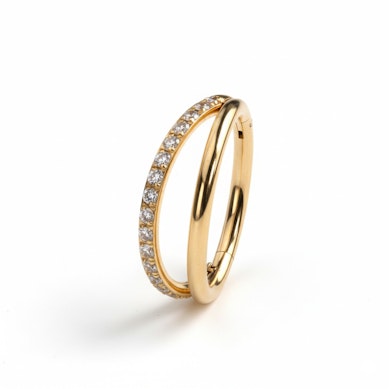 Doble aro de titanio con pedrería en una banda