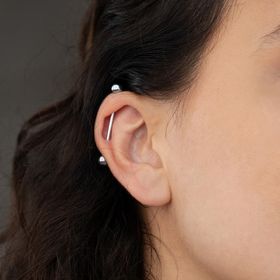 Barra de piercing con bolas