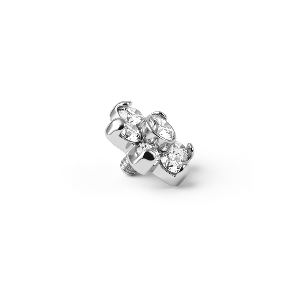Joya microdermal con brillantes que forman una flor