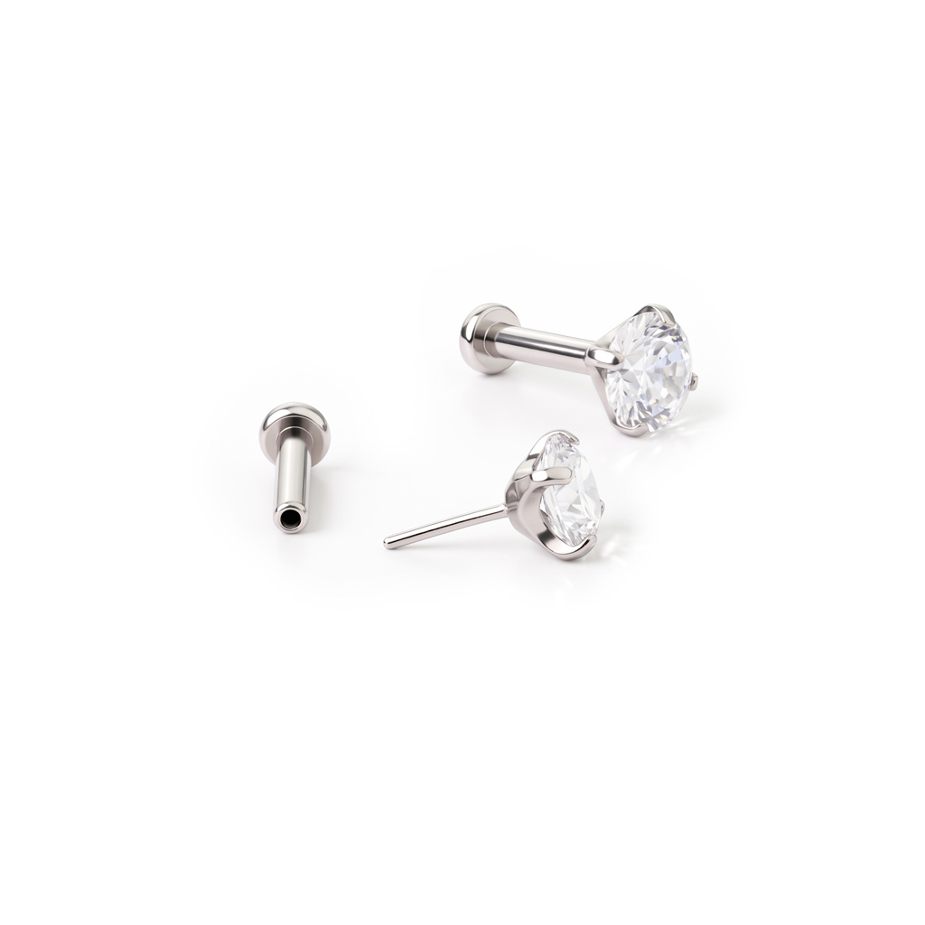 Labret push-in en titanio con brillante en engaste de garras
