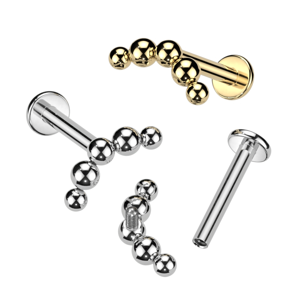 Labret de titanio decorado con línea de bolitas