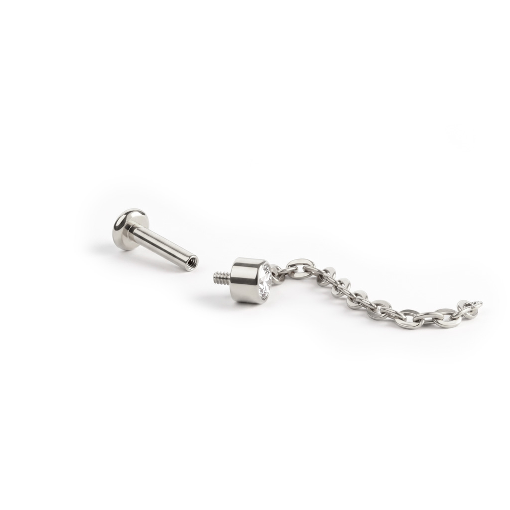 Delicado labret de titanio con piedra y cadena colgante