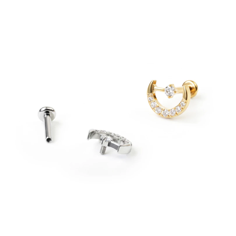 Labret de titanio con luna y estrella