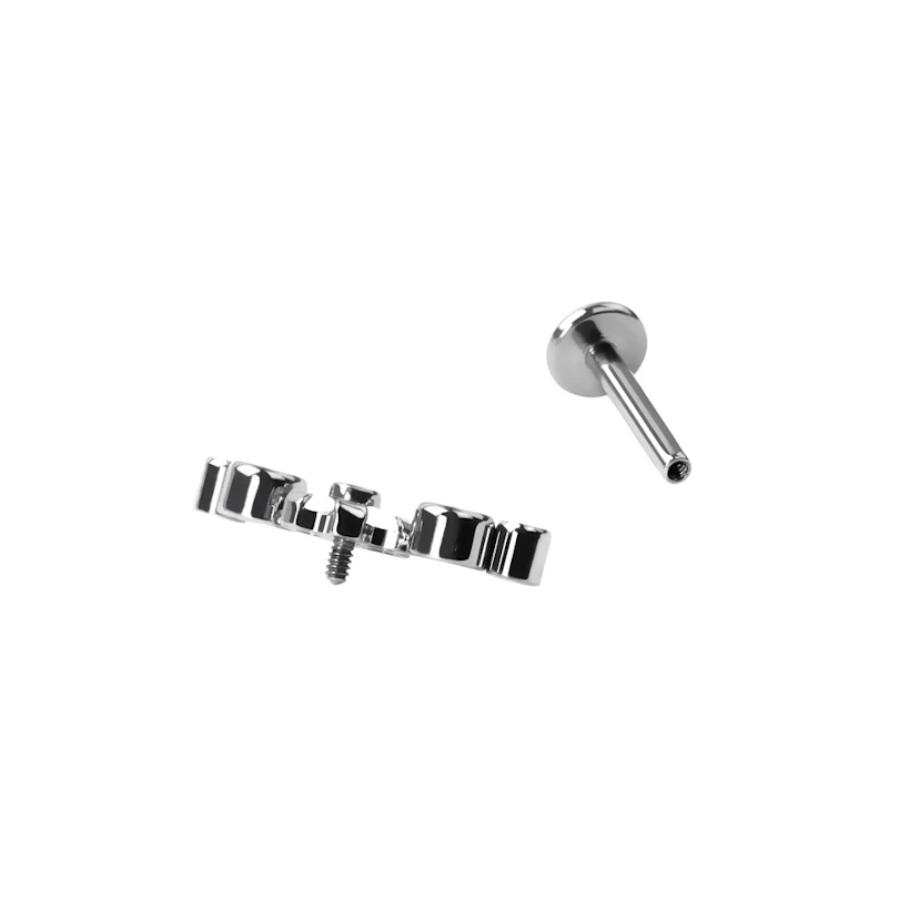 Labret de titanio con flor central y piedras circonitas