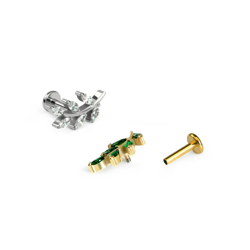 Labret de titanio con hoja y piedras brillantes