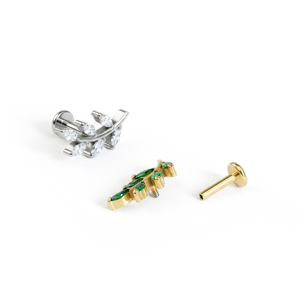 Labret de titanio con hoja y piedras brillantes