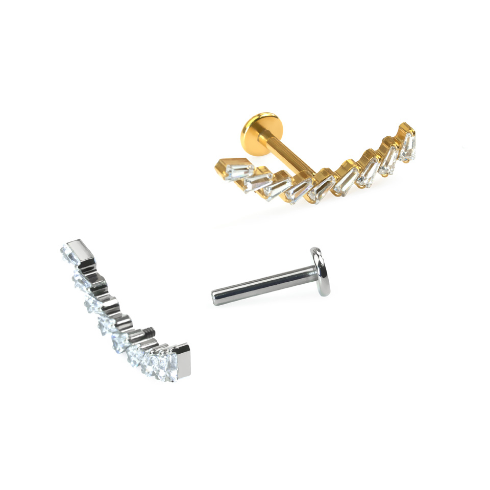 Labret de titanio con arco de piedras