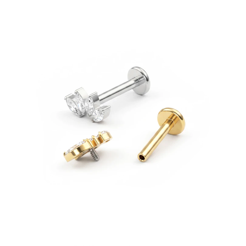 Labret de titanio con cuatro piedras marquise