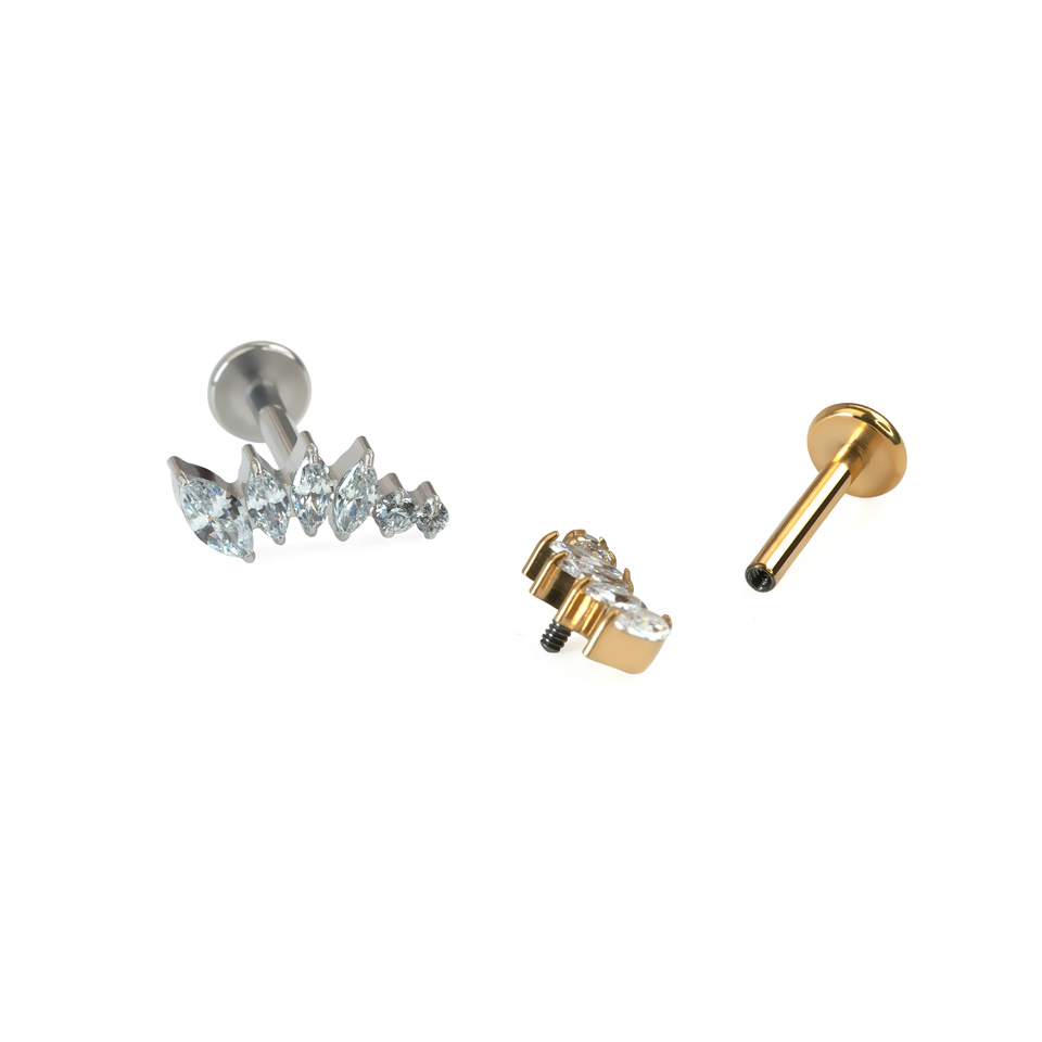 Labret curvado de titanio con piedras de tamaños crecientes