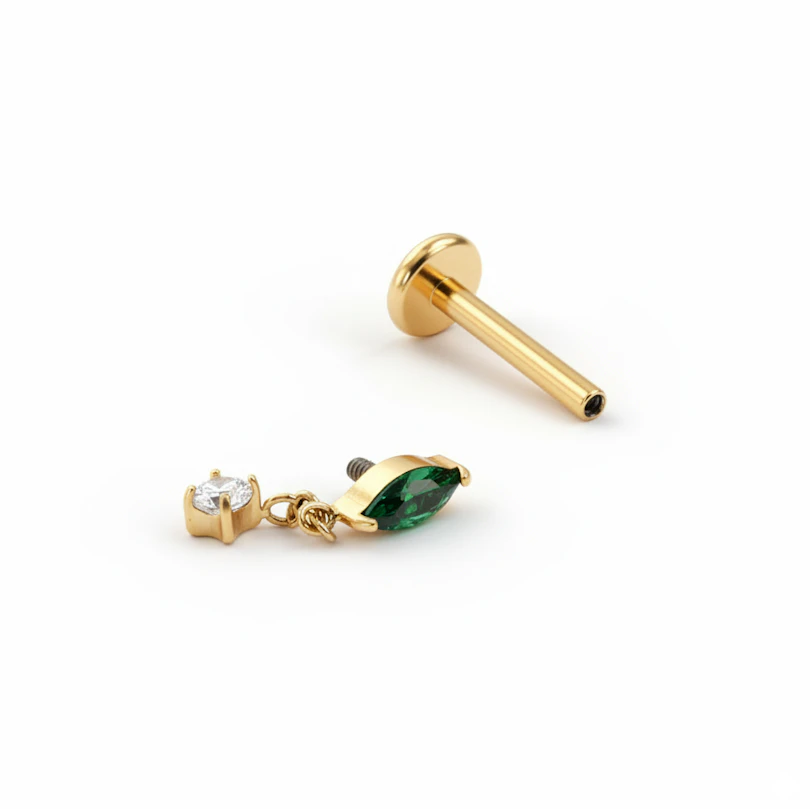 Labret de titanio con piedra esmeralda y colgante