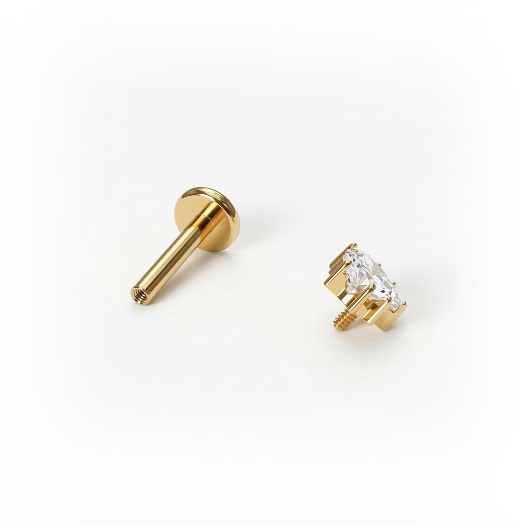 Labret de titanio con tríada de piedras en forma de estrella