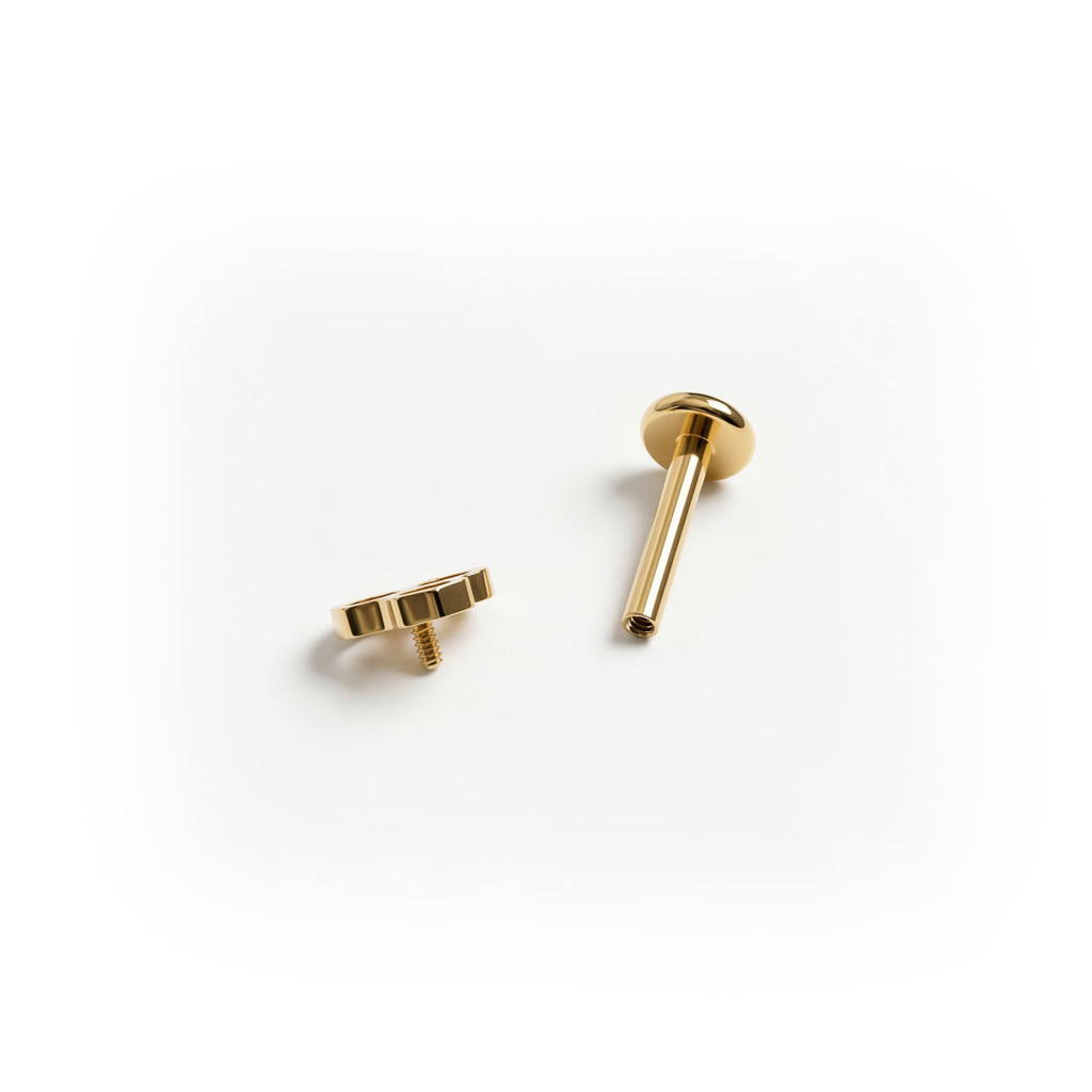 Labret de titanio con diseño de panal