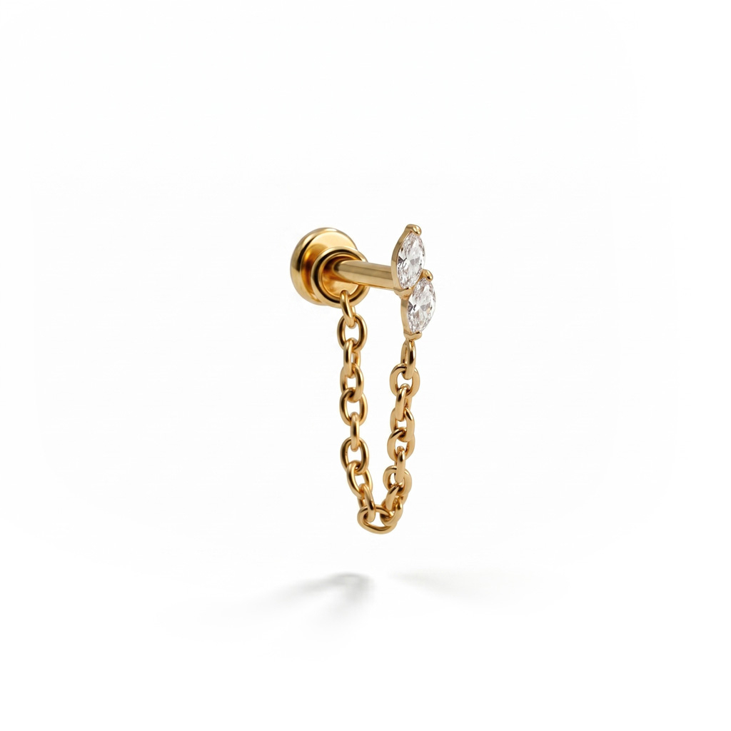 Labret de titanio con doble piedra marquesa y cadena