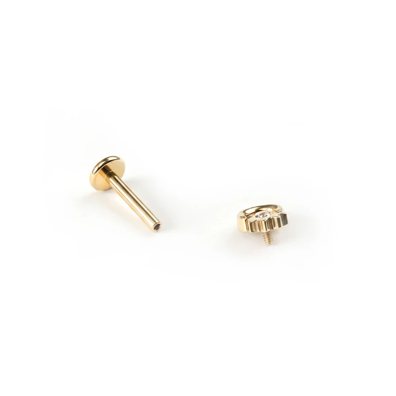 Labret de titanio con sol y luna