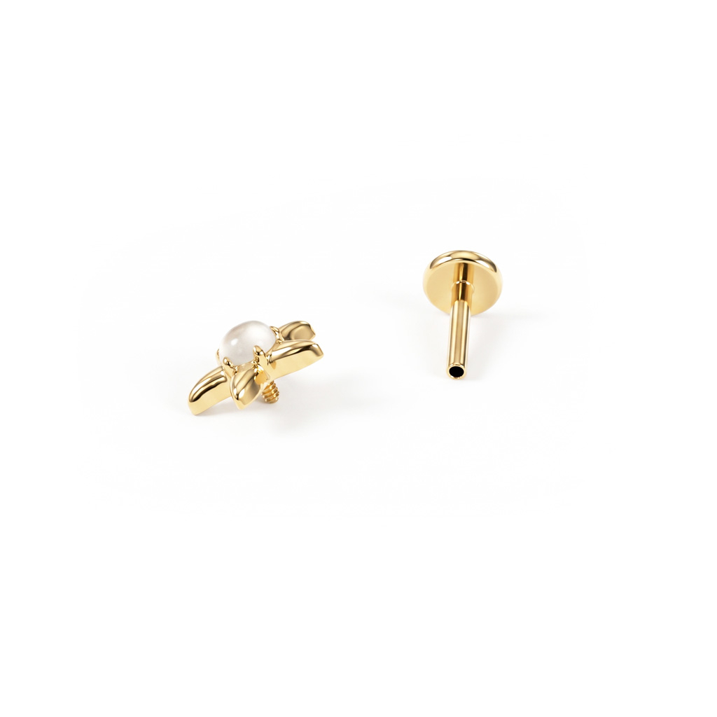Labret estrella de mar con piedra lunar en titanio