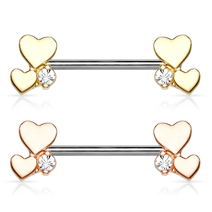 Piercing para el pezón con dos corazones y brillante en cada punta