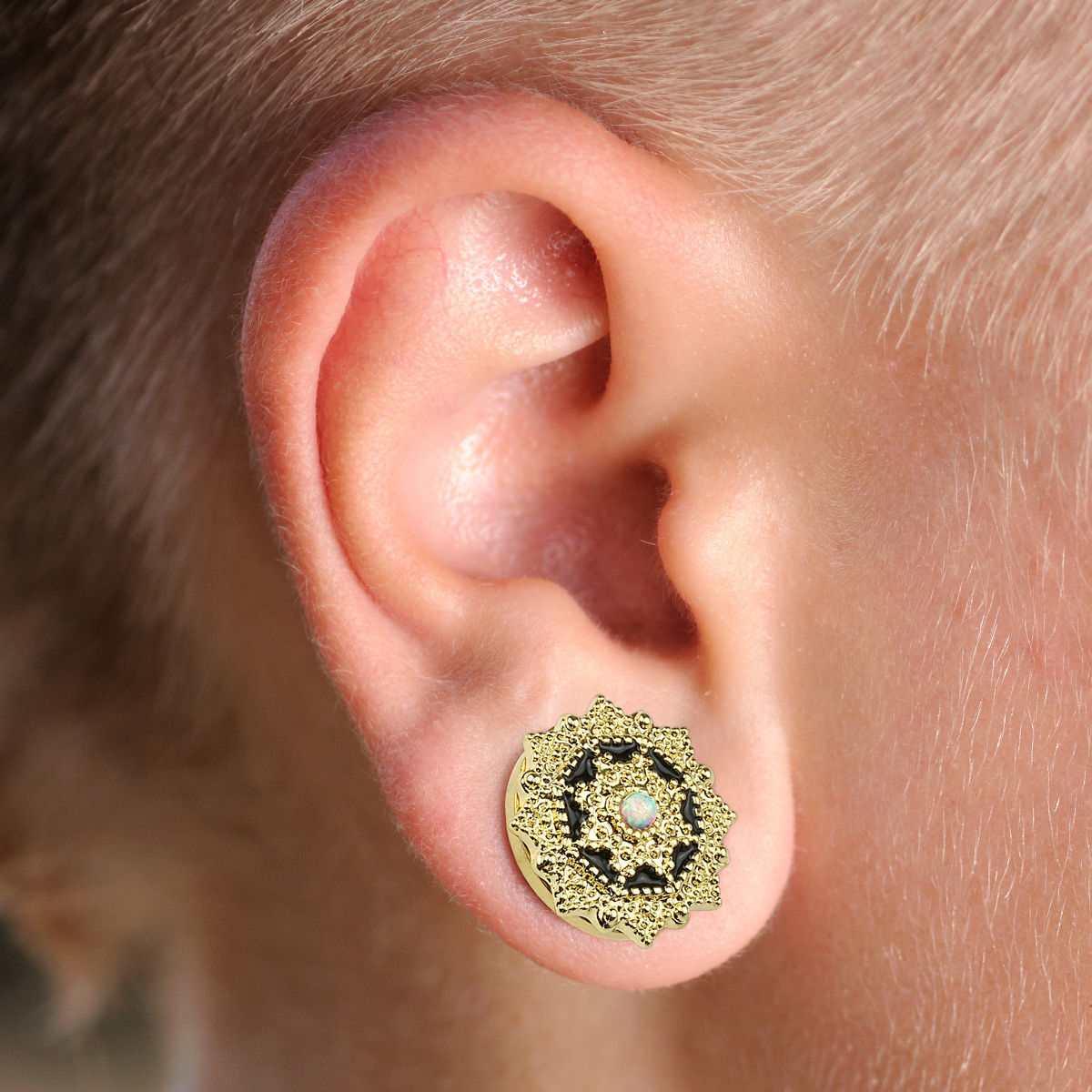 Plug con detalles y flor de ópalo en la parte frontal